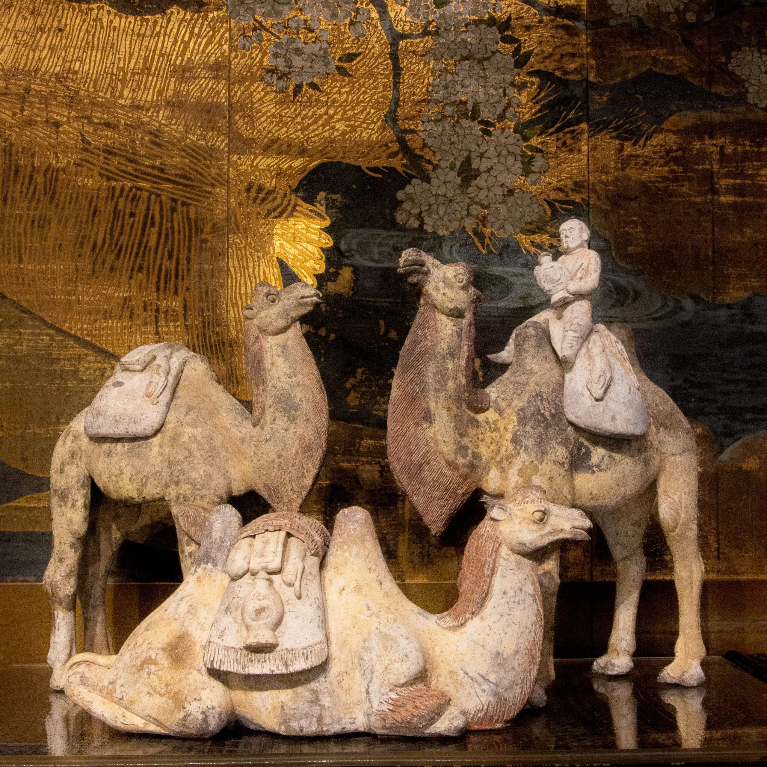 A rare set of Tang period camels and riders